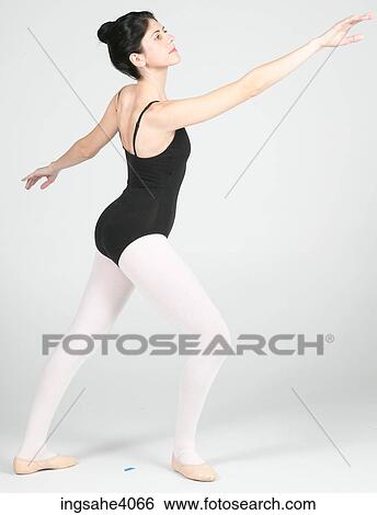 Ballerina standing in a pose View Large Photo Image Stock Photograph - Ballerina standing in a pose . Fotosearch