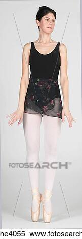Ballerina standing on her toes View Large Photo Image Stock Photography - Ballerina standing on her toes . Fotosearch