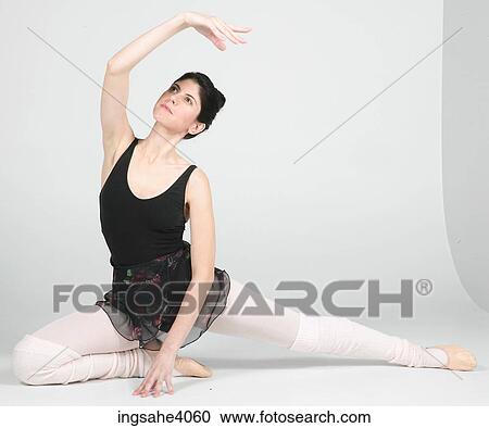 Ballerina stretched on the floor View Large Photo Image Stock Image - Ballerina stretched on the floor . Fotosearch