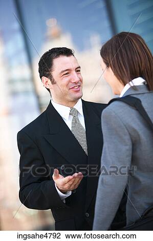 Businessman having conversation View Large Photo Image Stock Image - Businessman having conversation . Fotosearch