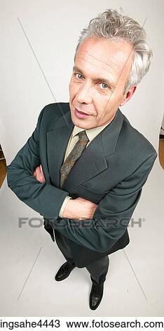 Businessman in black suit View Large Photo Image Stock Image - Businessman in black suit . Fotosearch
