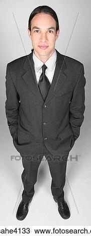 Businessman in gray suit View Large Photo Image Stock Image - Businessman in gray suit . Fotosearch