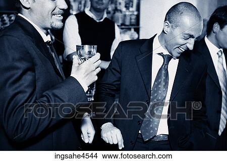 Businessmen in bar View Large Photo Image Picture - Businessmen in bar . Fotosearch