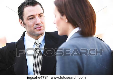 Picture - Businesspeople having conversation . Fotosearch