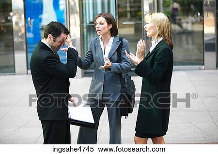 Stock Photography - Businesspeople having disagreement . Fotosearch