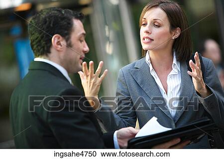 Businesspeople having discussion View Large Photo Image Stock Image - Businesspeople having discussion . Fotosearch