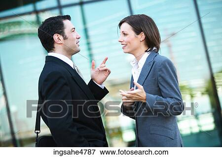 Businesspeople having discussion View Large Photo Image Stock Photo - Businesspeople having discussion . Fotosearch