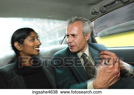 Businesspeople in car View Large Photo Image Stock Photo - Businesspeople in car . Fotosearch