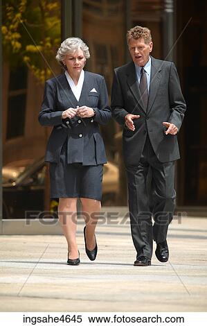 Businesspeople in conversation View Large Photo Image Stock Photography - Businesspeople in conversation . Fotosearch