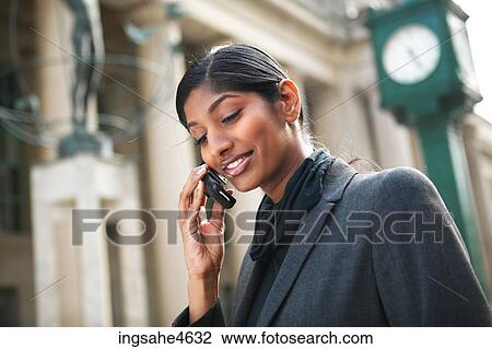 Businesswoman on cell phone View Large Photo Image Stock Image - Businesswoman on cell phone . Fotosearch