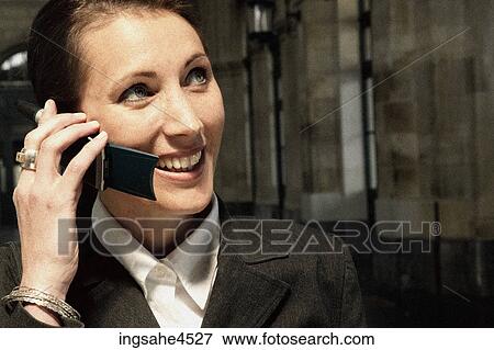 Businesswoman on cell phone View Large Photo Image Stock Photo - Businesswoman on cell phone . Fotosearch