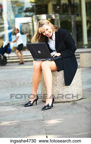 Businesswoman using laptop computer View Large Photo Image Stock Image - Businesswoman using laptop computer . Fotosearch