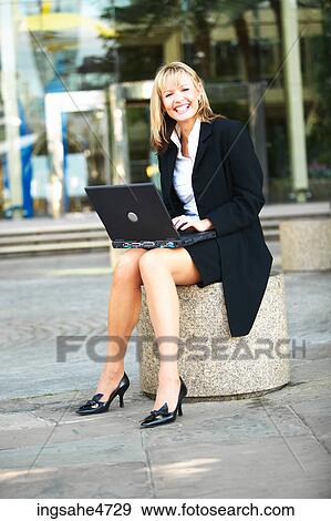Businesswoman using laptop computer View Large Photo Image Stock Photo - Businesswoman using laptop computer . Fotosearch