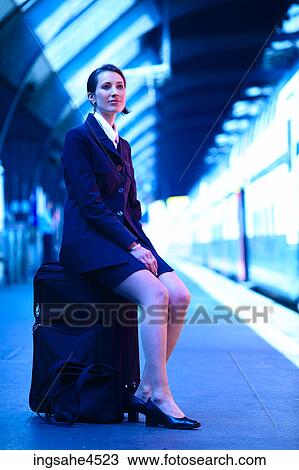 Businesswoman waiting for train View Large Photo Image Stock Image - Businesswoman waiting for train . Fotosearch