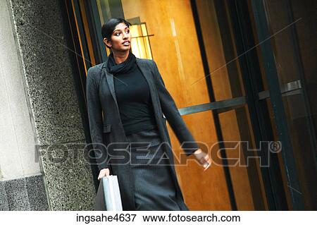 Businesswoman with briefcase View Large Photo Image Stock Photo - Businesswoman with briefcase . Fotosearch