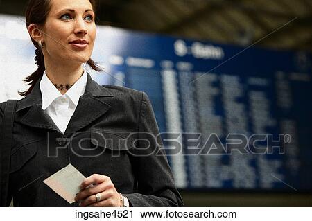 Businesswoman with ticket View Large Photo Image Stock Image - Businesswoman with ticket . Fotosearch
