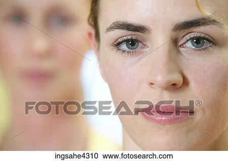 Close-up of serious woman's face View Large Photo Image Stock Image - Close-up of serious woman's face. Fotosearch