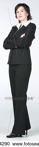Confident businesswoman in black suit View Large Photo Image Stock Image - Confident businesswoman in black suit . Fotosearch