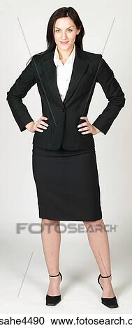 Confident businesswoman in black suit View Large Photo Image Stock Image - Confident businesswoman in black suit . Fotosearch