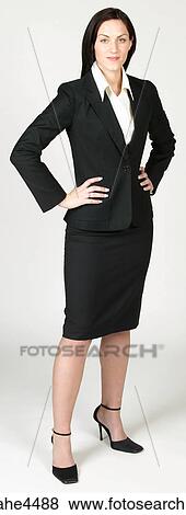 Confident businesswoman in black suit View Large Photo Image Stock Photo - Confident businesswoman in black suit. Fotosearch