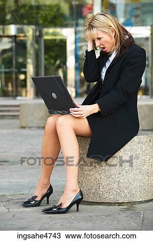 Frustrated businesswoman with laptop View Large Photo Image Stock Image - Frustrated businesswoman with laptop . Fotosearch