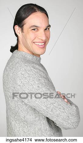 Grinning man in gray sweater View Large Photo Image Picture - Grinning man in gray sweater. Fotosearch