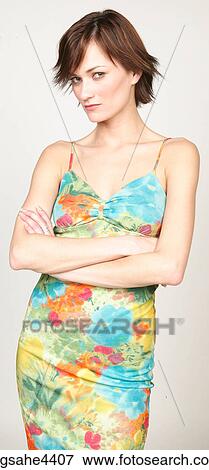 Irritated woman in floral sundress View Large Photo Image Stock Photo - Irritated woman in floral sundress. Fotosearch