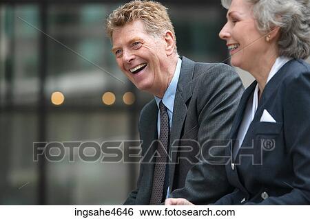 Laughing businesspeople View Large Photo Image Stock Photograph - Laughing businesspeople . Fotosearch