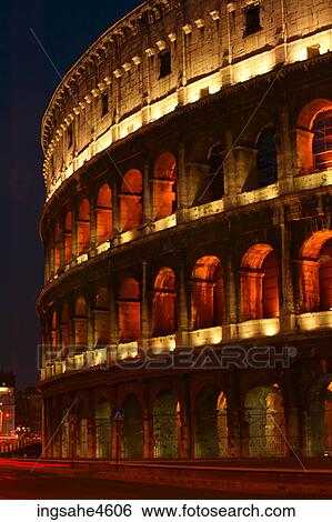 Lights on the Coliseum in Rome at night View Large Photo Image Stock Photograph - Lights on the Coliseum in Rome at night . Fotosearch