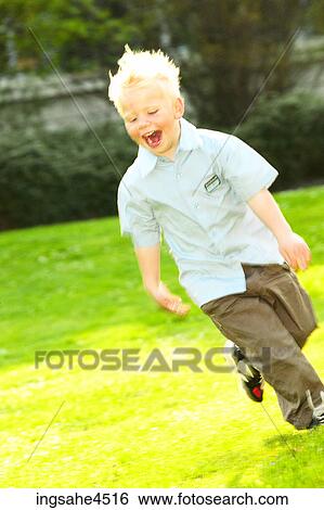 Little boy playing View Large Photo Image Stock Photograph - Little boy playing . Fotosearch