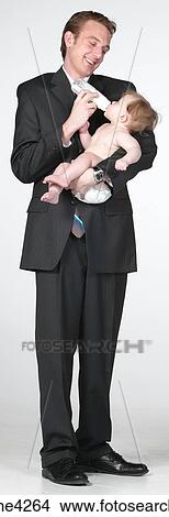 Picture - Man feeding baby . Fotosearch
