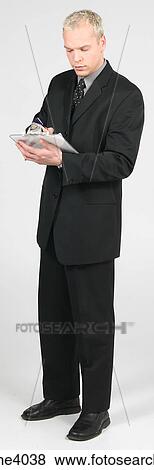 Man holding a clipboard View Large Photo Image Stock Photo - Man holding a clipboard . Fotosearch