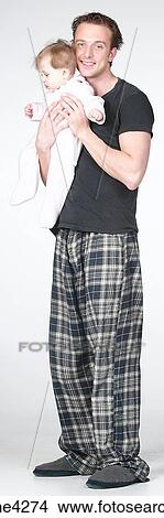 Picture - Man holding baby . Fotosearch