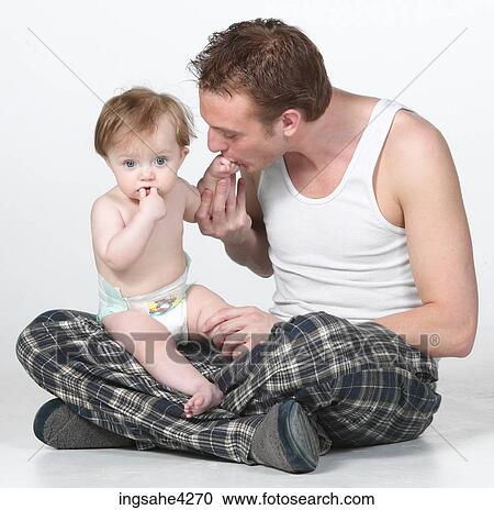 Man holding baby View Large Photo Image Stock Image - Man holding baby . Fotosearch