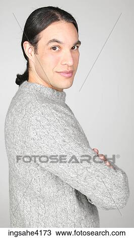 Man in gray sweater View Large Photo Image Stock Image - Man in gray sweater . Fotosearch