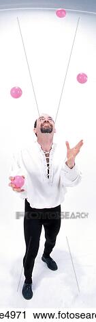 Stock Image - man juggling . Fotosearch