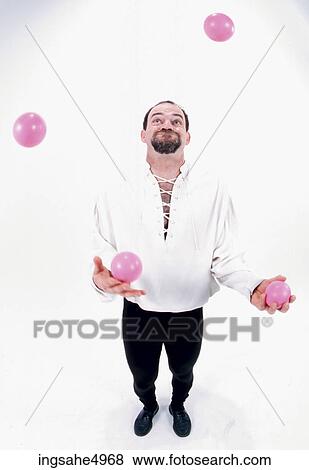 Stock Photo - man juggling . Fotosearch