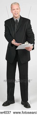 Man pointing at a clipboard View Large Photo Image Stock Photo - Man pointing at a clipboard . Fotosearch