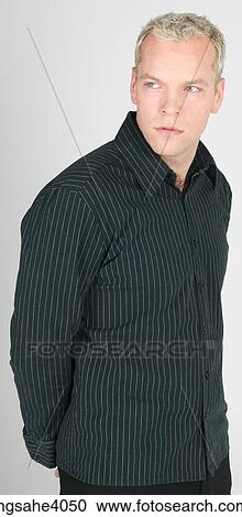 Man standing and gazing ahead View Large Photo Image Stock Image - Man standing and gazing ahead . Fotosearch