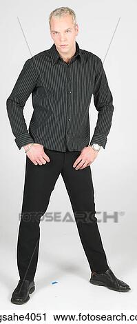 Stock Image - Man standing in a pose . Fotosearch