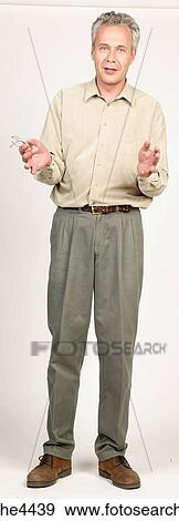 Stock Photo - Man talking and gesturing with his hands. Fotosearch