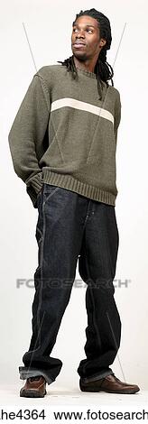 Man with dreadlocks in jeans and sweater View Large Photo Image Picture - Man with dreadlocks in jeans and sweater . Fotosearch
