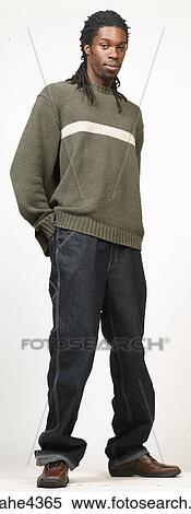 Man with dreadlocks in jeans and sweater View Large Photo Image Stock Photography - Man with dreadlocks in jeans and sweater. Fotosearch