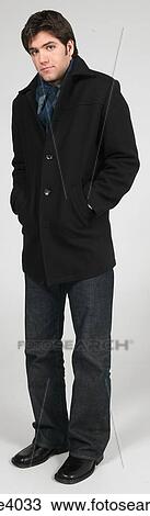Stock Image - Man with his hands in his pockets . Fotosearch