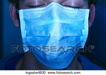 Person with eyes closed wearing face mask View Large Photo Image Stock Image - Person with eyes closed wearing face mask . Fotosearch