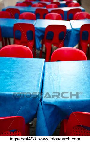 Plastic chairs and tables View Large Photo Image Stock Photo - Plastic chairs and tables . Fotosearch