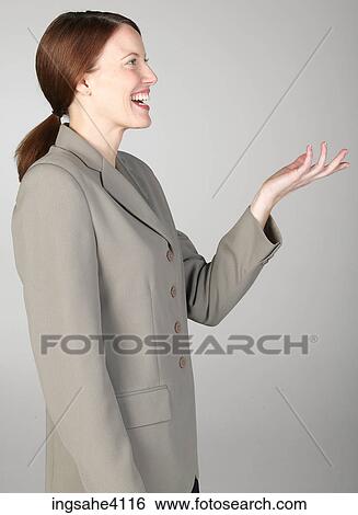 Profile of gesturing businesswoman View Large Photo Image Stock Photograph - Profile of gesturing businesswoman. Fotosearch