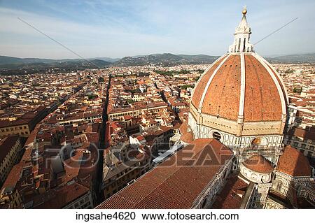 Red-roofed cathedral dome overlooking city View Large Photo Image Stock Image - Red-roofed cathedral dome overlooking city . Fotosearch