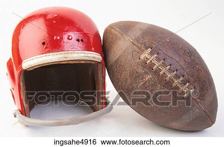 Red sports helmet with ball View Large Photo Image Stock Photograph - Red sports helmet with ball . Fotosearch