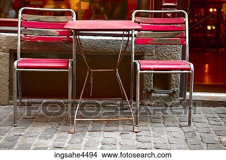 Picture - Red table and chairs . Fotosearch
